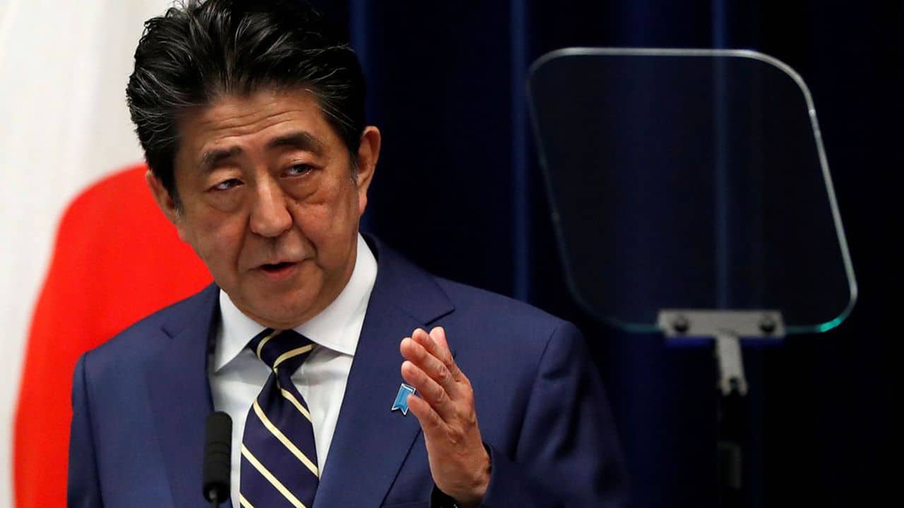 FILE PHOTO - Japan's Prime Minister Shinzo Abe holds a news conference on Japan's response to the coronavirus disease (COVID-19) outbreak, at his official residence in Tokyo, Japan, March 28, 2020. REUTERS/Issei Kato/File Picture